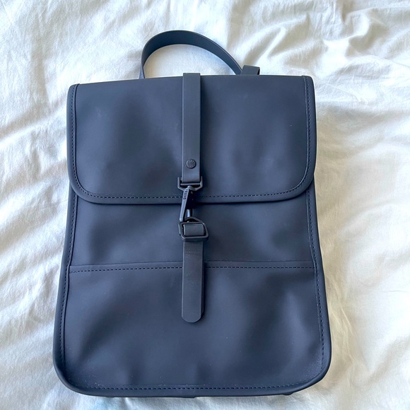 Rains Handbags - Rains Backpack micro in black, used three times. Fits 13” laptop